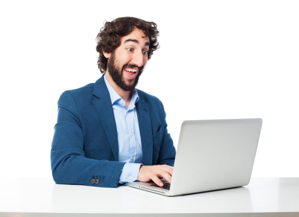Business man excited at computer